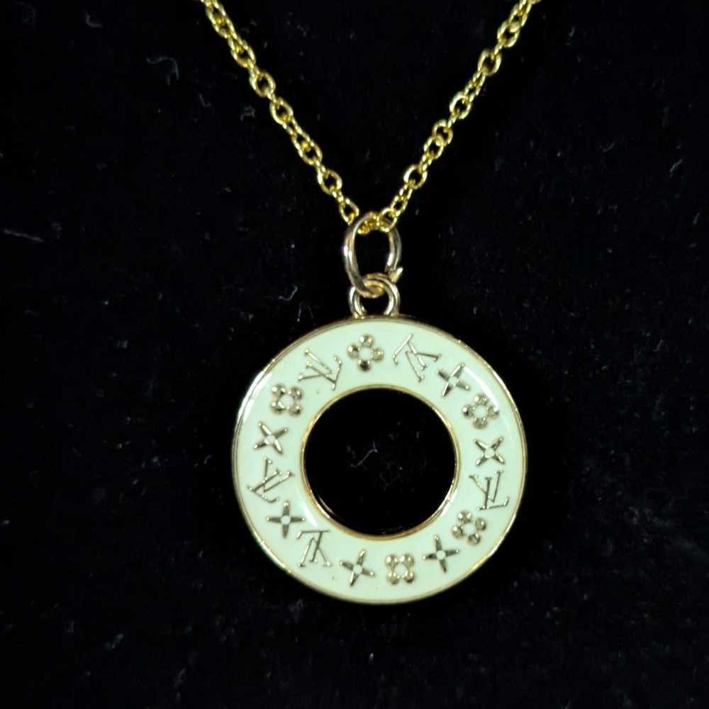 Louis Vuitton Gold and Cream Pendant Necklace